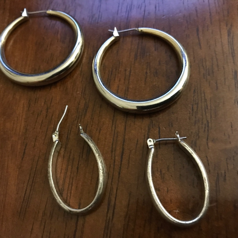 Two pair Silvertone pierced earrings